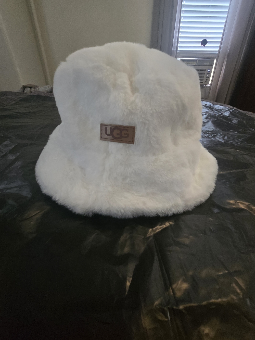 UGG Kids Plush White Faux-Fur Bucket Hat with Logo Patch